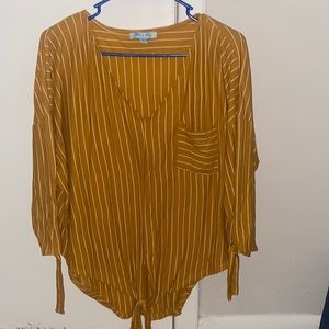 This is a cute shirt I bought from a boutique about 6 months ago. Barely worn